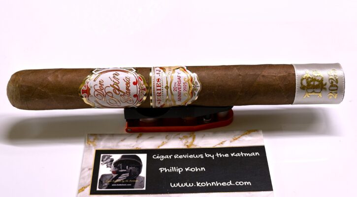 Cigar with branding and review card
