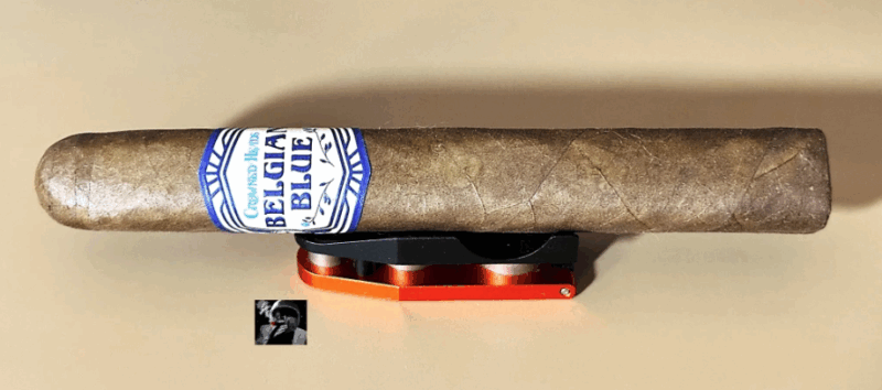 Cigar resting on a cutter